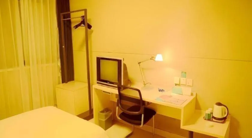 Bed in Jinjiang Inn Changzhou Global Dinosaur City Olympic Center