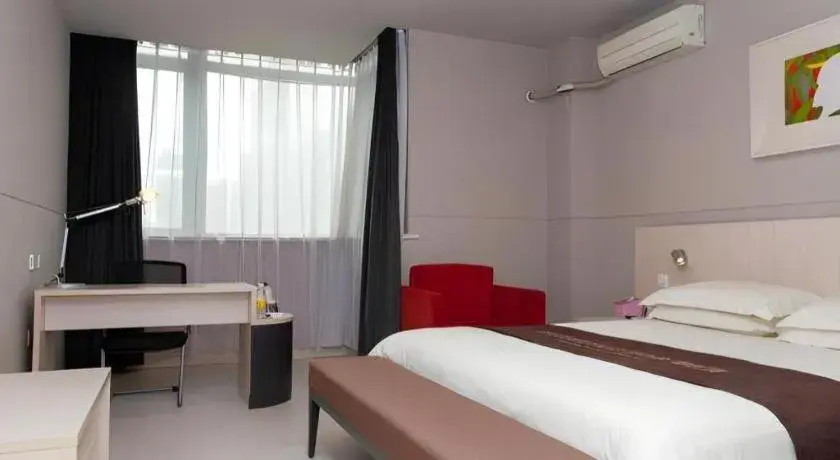 Bed in Jinjiang Inn Changzhou Global Dinosaur City Olympic Center Bed in Jinjiang Inn Changzhou Global Dinosaur City Olympic Center