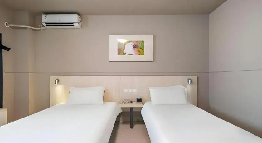 Bed in Jinjiang Inn Changzhou Global Dinosaur City Olympic Center Bed in Jinjiang Inn Changzhou Global Dinosaur City Olympic Center