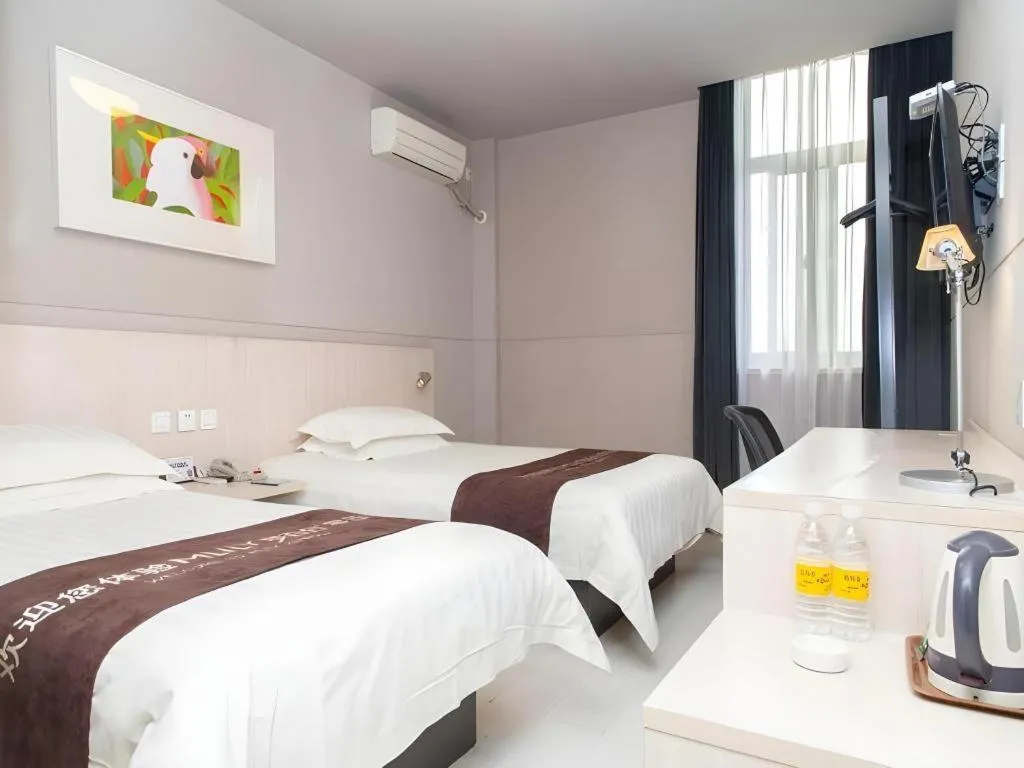 Bed in Jinjiang Inn Changzhou Global Dinosaur City Olympic Center