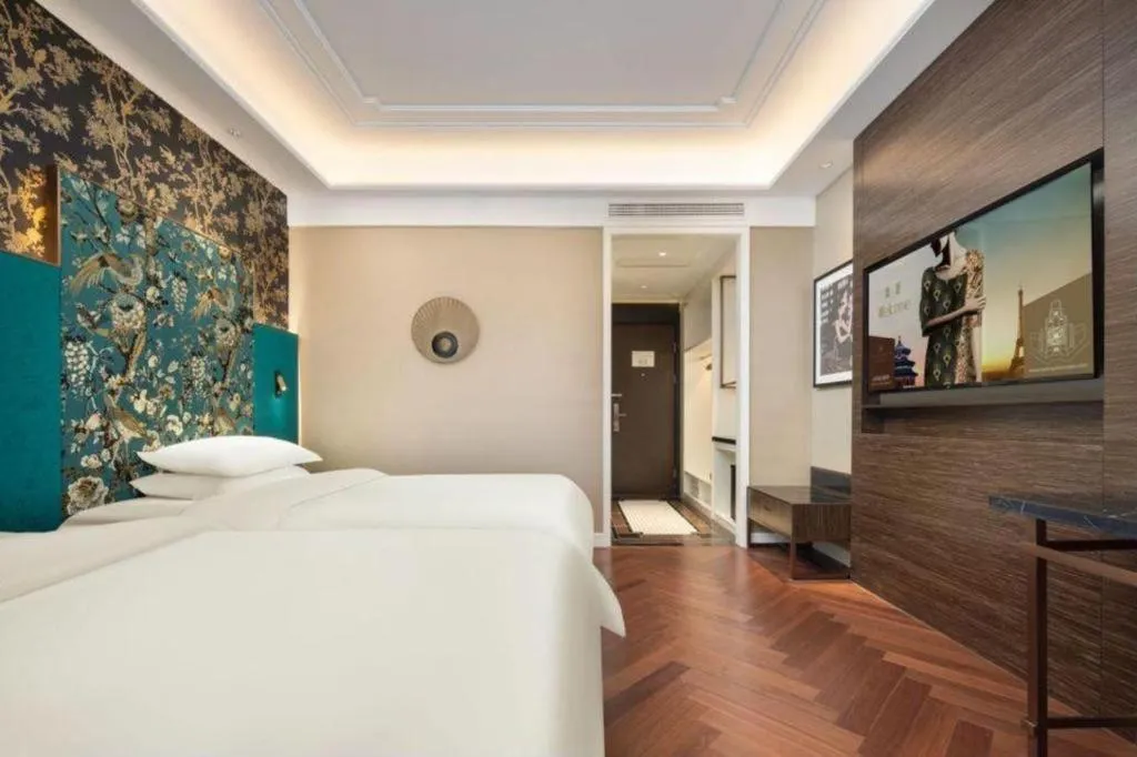 Bed in Jinjiang Metropolo Hotel - Taizhou Wanda Plaza