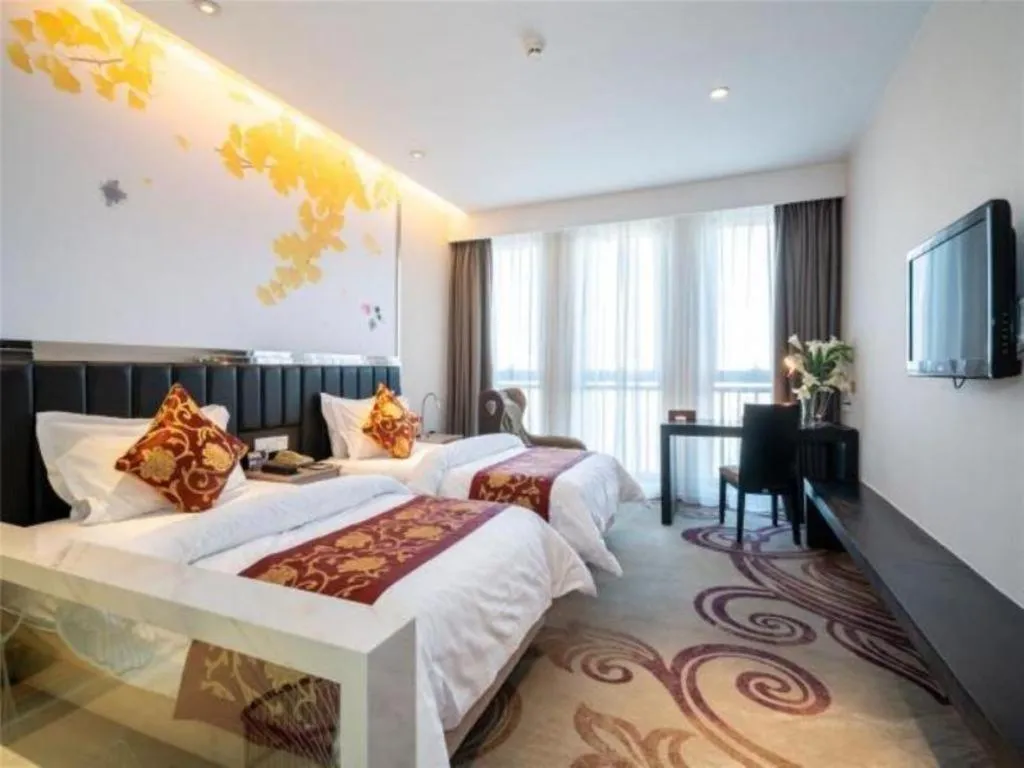Bed in Jinjiang Metropolo Hotel - Taizhou Wanda Plaza