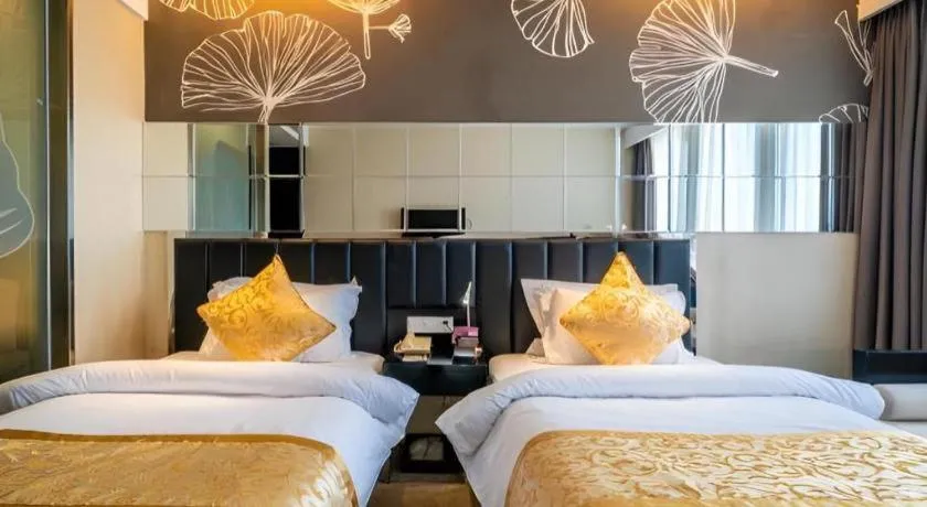 Bed in Jinjiang Metropolo Hotel - Taizhou Wanda Plaza