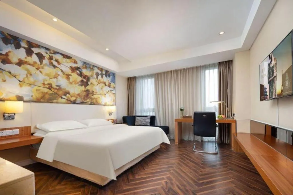 Bed in Jinjiang Metropolo Hotel - Taizhou Wanda Plaza