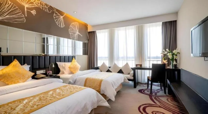 Bed in Jinjiang Metropolo Hotel - Taizhou Wanda Plaza