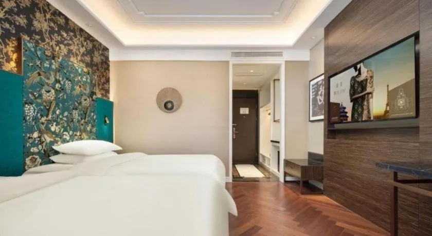 Bed in Jinjiang Metropolo Hotel - Taizhou Wanda Plaza