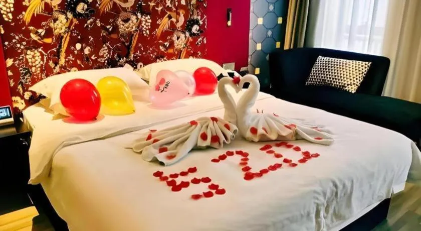 Bed in Jinjiang Metropolo Hotel - Taizhou Wanda Plaza