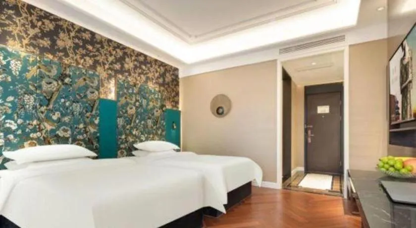 Bed in Jinjiang Metropolo Hotel - Taizhou Wanda Plaza