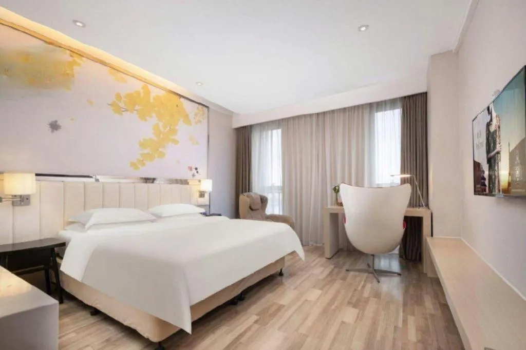 Bed in Jinjiang Metropolo Hotel - Taizhou Wanda Plaza