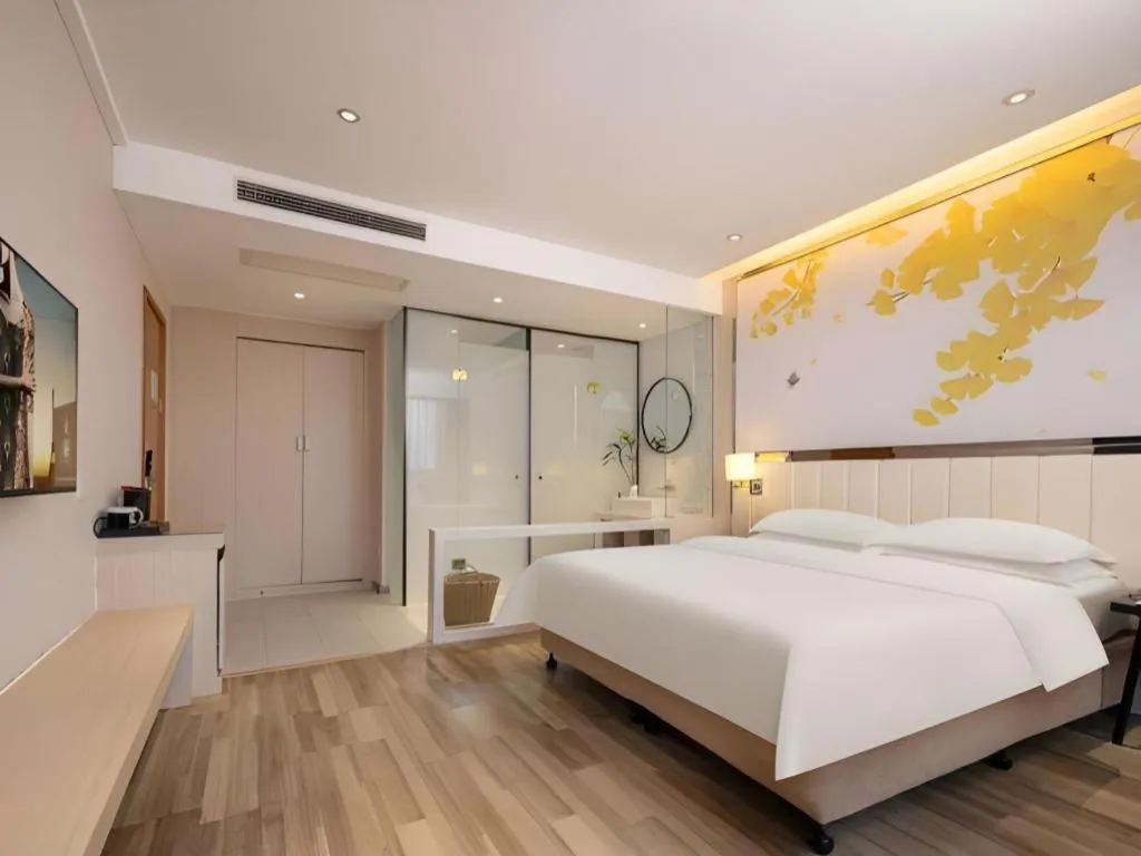 Bed in Jinjiang Metropolo Hotel - Taizhou Wanda Plaza