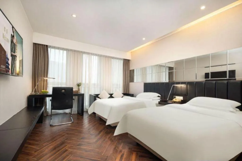 Bed in Jinjiang Metropolo Hotel - Taizhou Wanda Plaza