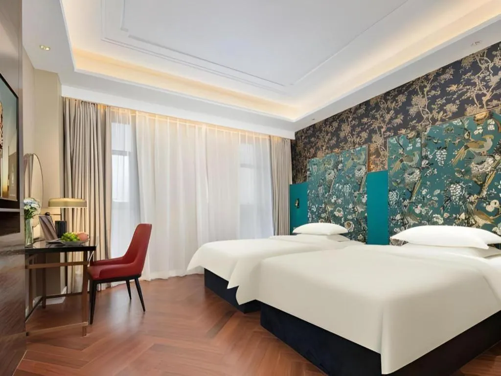 Bed in Jinjiang Metropolo Hotel - Taizhou Wanda Plaza
