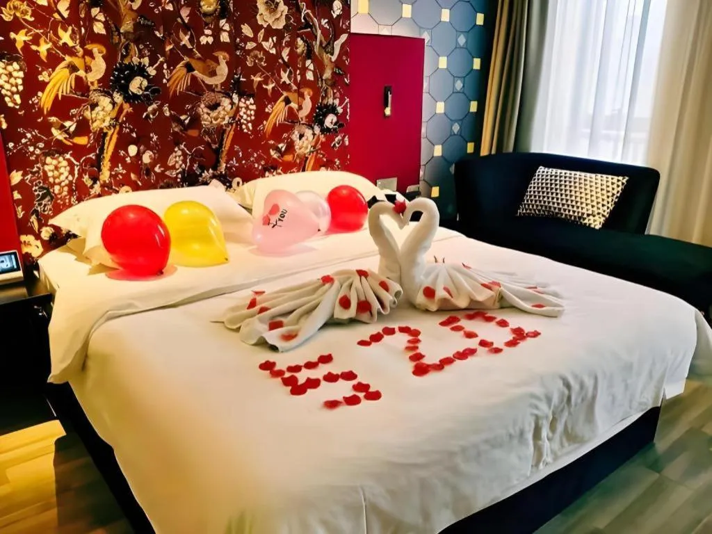 Bed in Jinjiang Metropolo Hotel - Taizhou Wanda Plaza