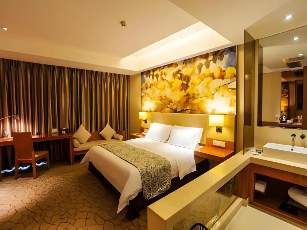 Bed in Jinjiang Metropolo Hotel - Taizhou Wanda Plaza