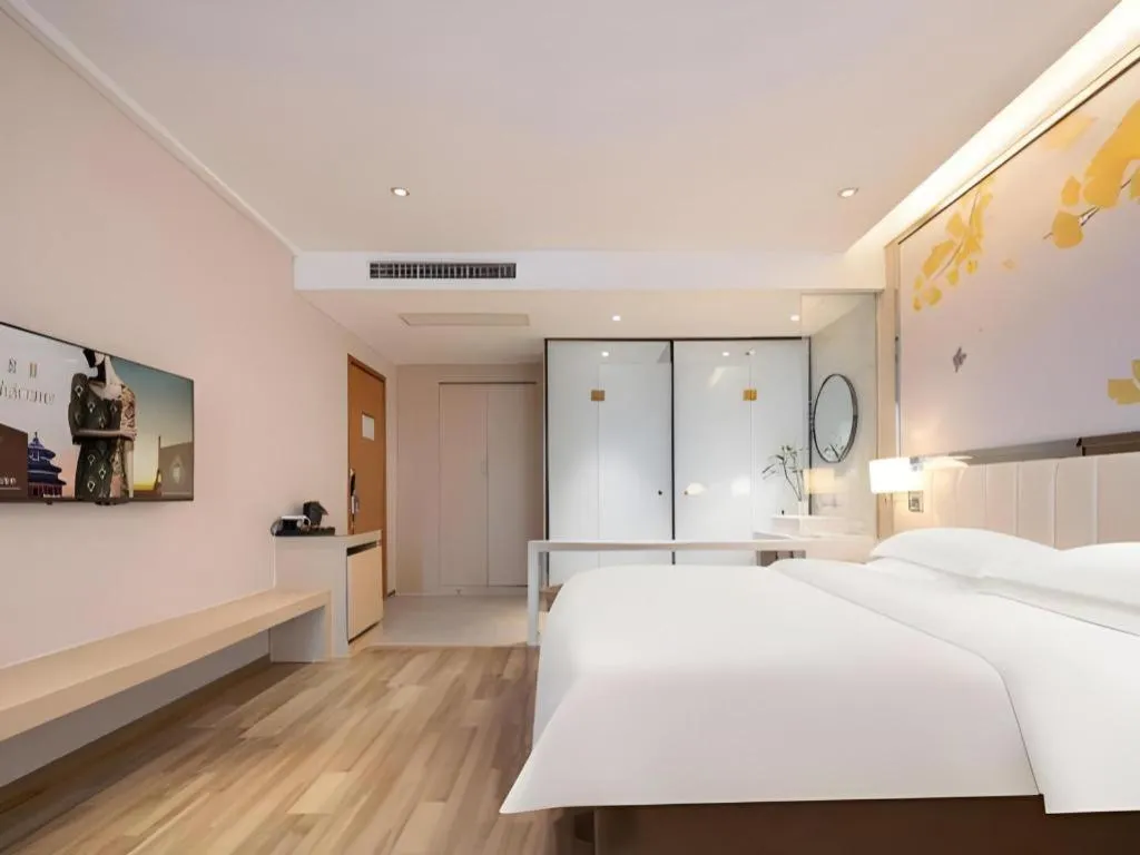 Bed in Jinjiang Metropolo Hotel - Taizhou Wanda Plaza