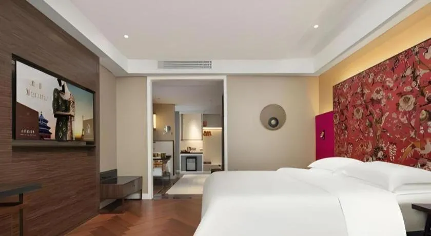 Bed in Jinjiang Metropolo Hotel - Taizhou Wanda Plaza