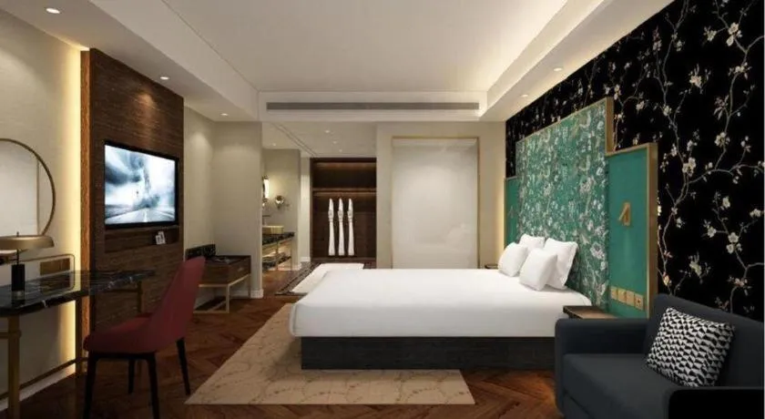 Bed in Jinjiang Metropolo Hotel - Taizhou Wanda Plaza