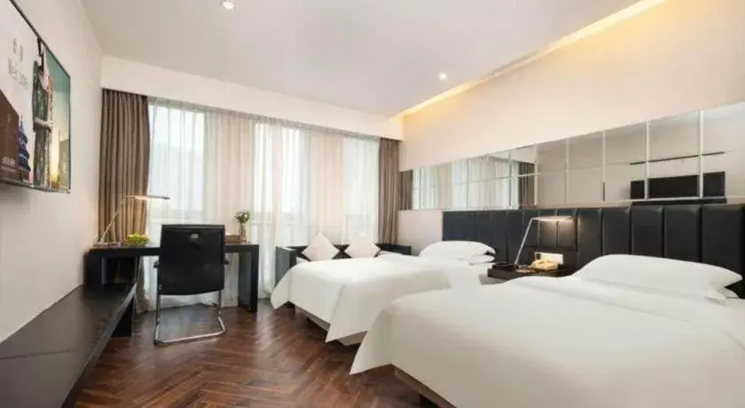 Bed in Jinjiang Metropolo Hotel - Taizhou Wanda Plaza Bed in Jinjiang Metropolo Hotel - Taizhou Wanda Plaza