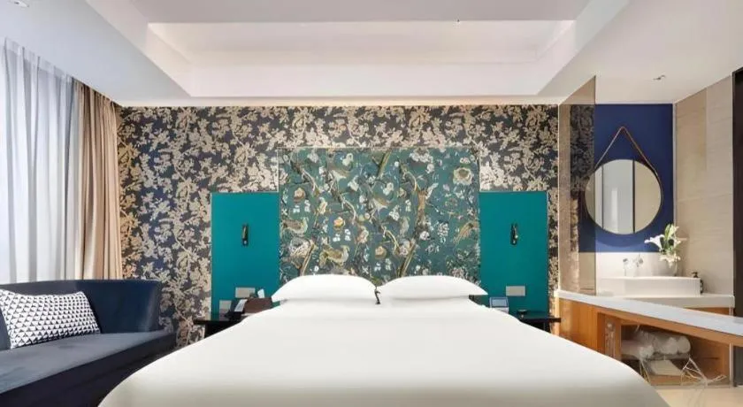 Bed in Jinjiang Metropolo Hotel - Taizhou Wanda Plaza