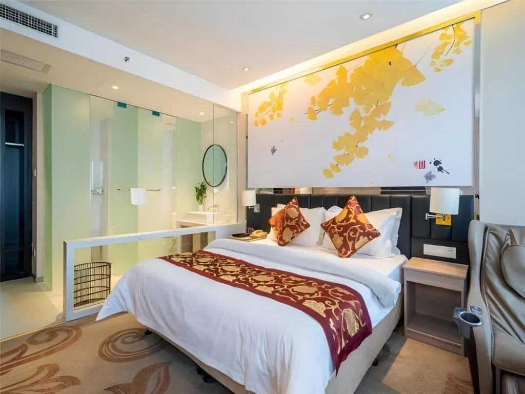 Bed in Jinjiang Metropolo Hotel - Taizhou Wanda Plaza
