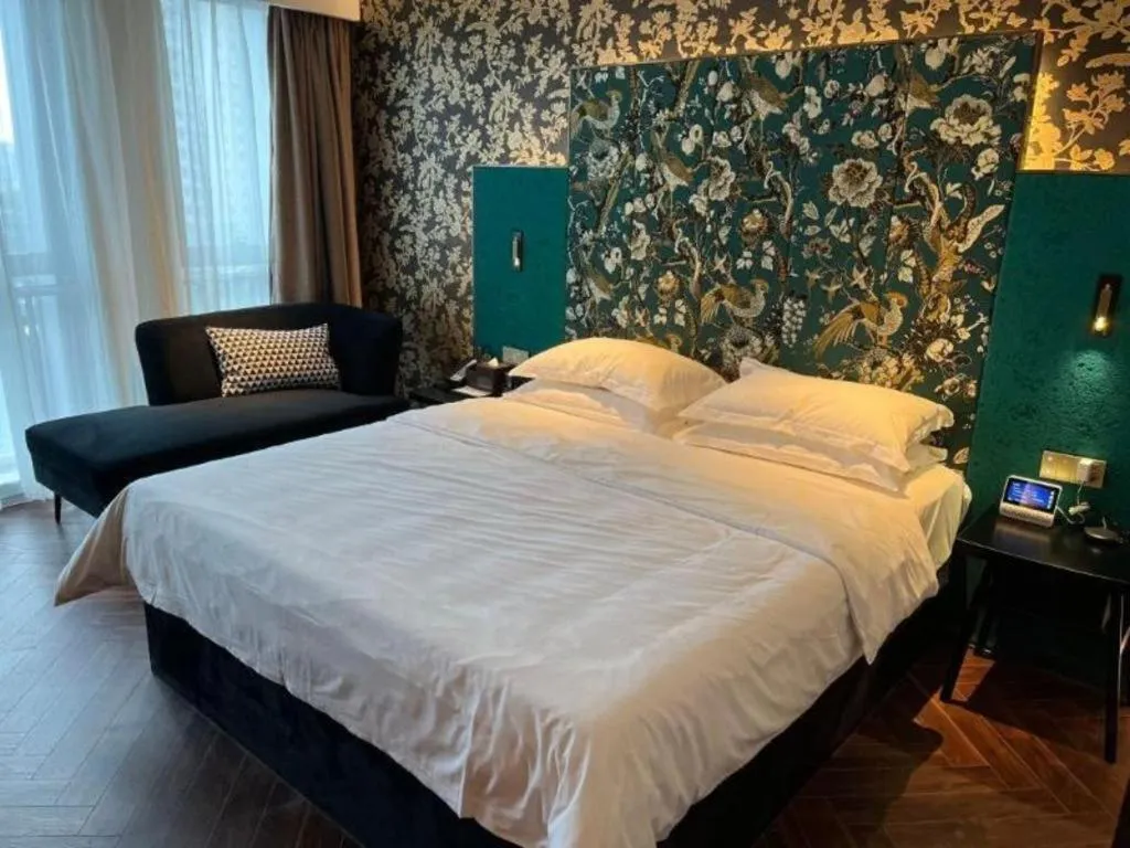 Bed in Jinjiang Metropolo Hotel - Taizhou Wanda Plaza