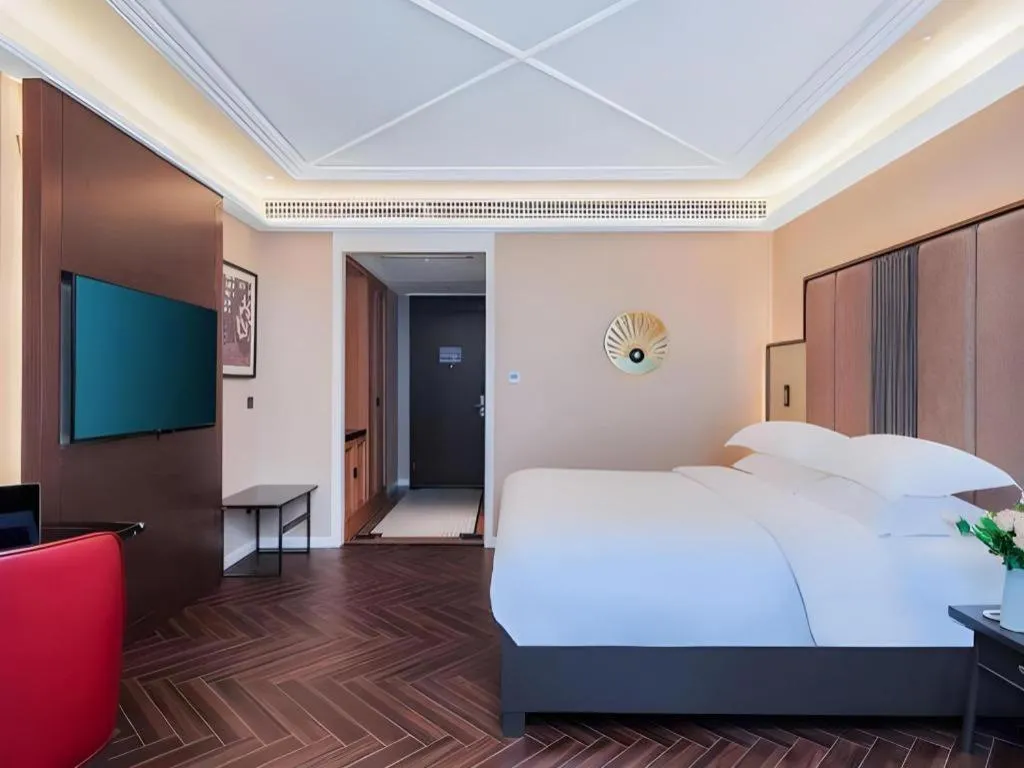 Bed in Jinjiang Metropolo Hotel - Taizhou Wanda Plaza