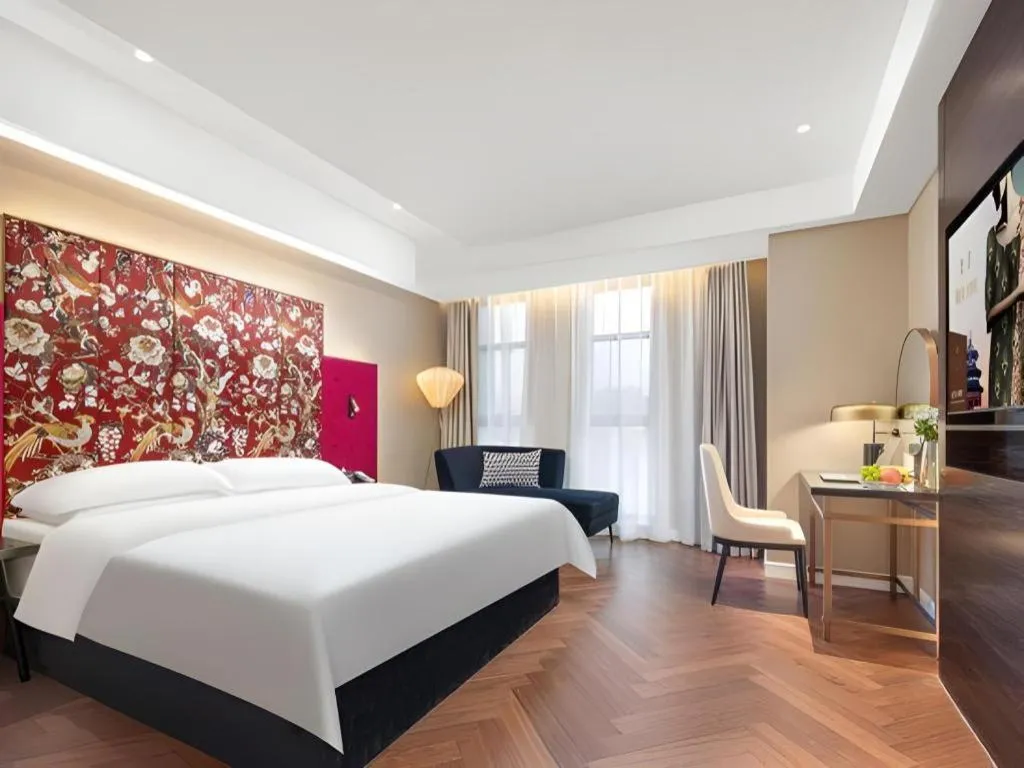 Bed in Jinjiang Metropolo Hotel - Taizhou Wanda Plaza