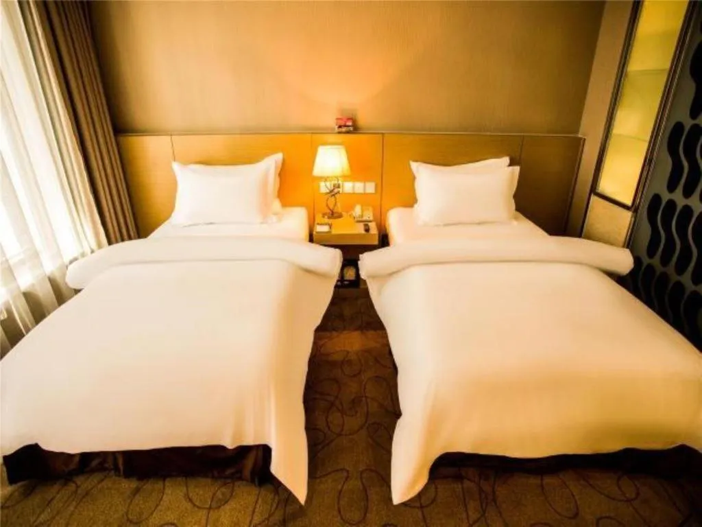 Bed in Jinjiang Metropolo Hotel - Langfang Wanda Plaza