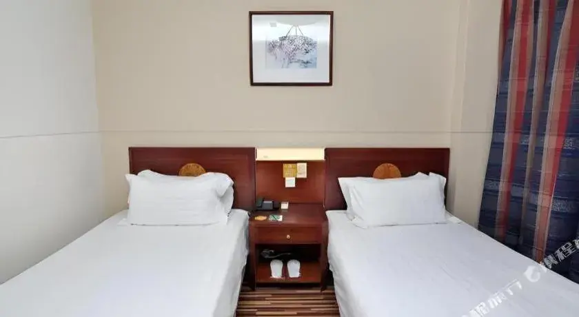 Bed in Jinjiang Inn Shanghai North Bund Yangpu Bridge Branch Bed in Jinjiang Inn Shanghai North Bund Yangpu Bridge Branch