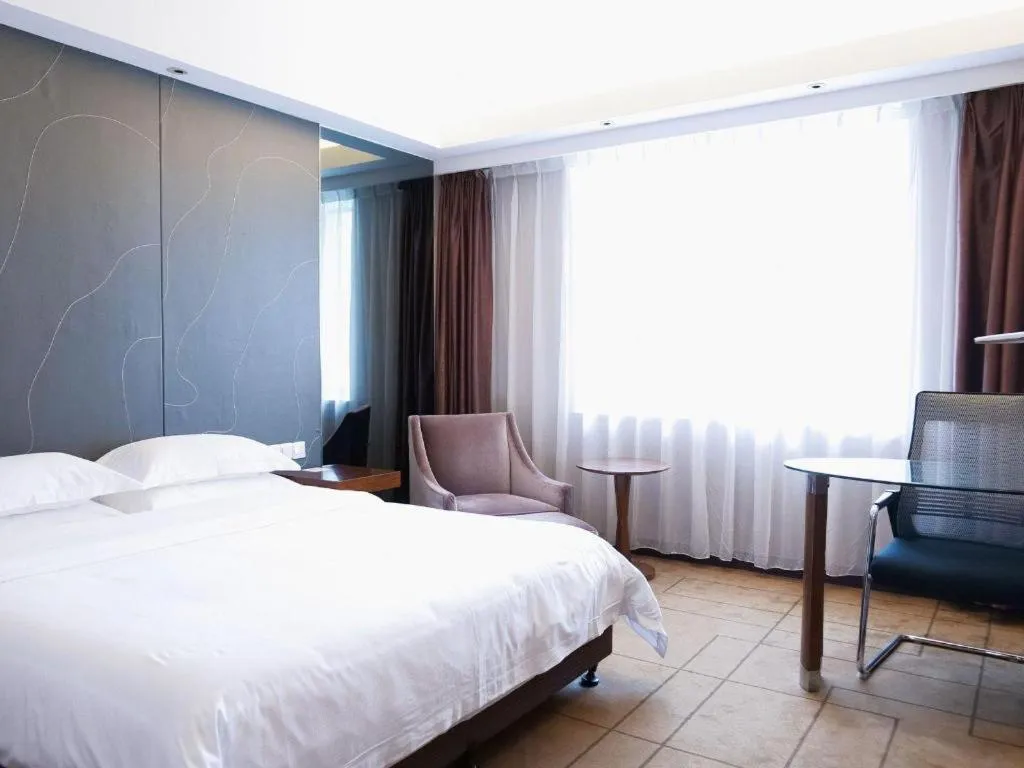 Bed in Metropolo Hotel Shijiazhuang Yuhua Wanda Plaza