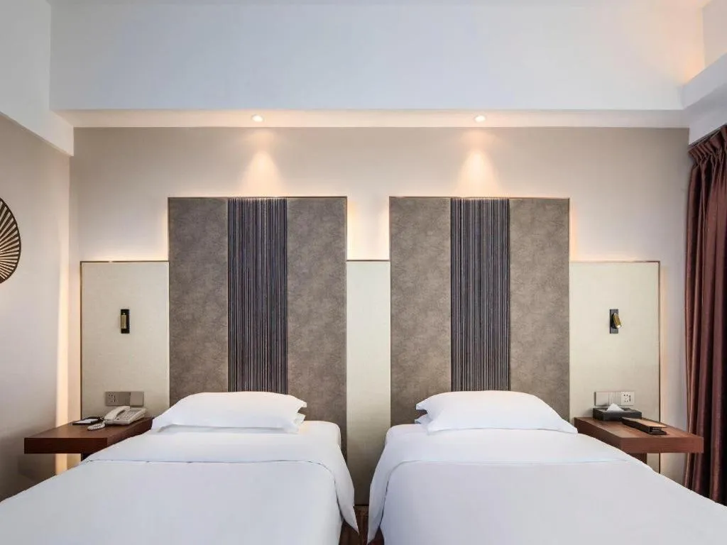 Bed in Metropolo Hotel Shijiazhuang Yuhua Wanda Plaza