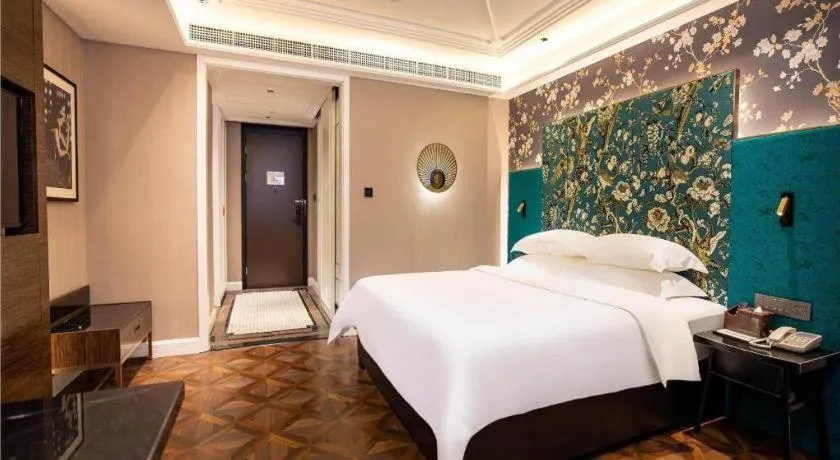 Bed in Metropolo Hotel Shijiazhuang Yuhua Wanda Plaza