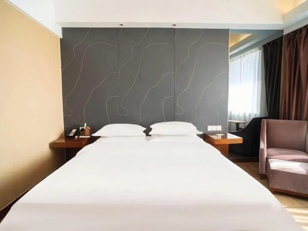 Bed in Metropolo Hotel Shijiazhuang Yuhua Wanda Plaza