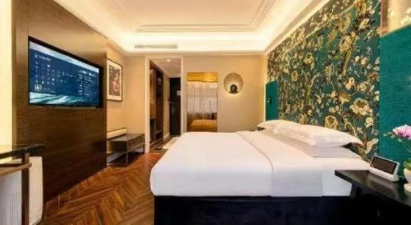 Bed in Metropolo Hotel Shijiazhuang Yuhua Wanda Plaza