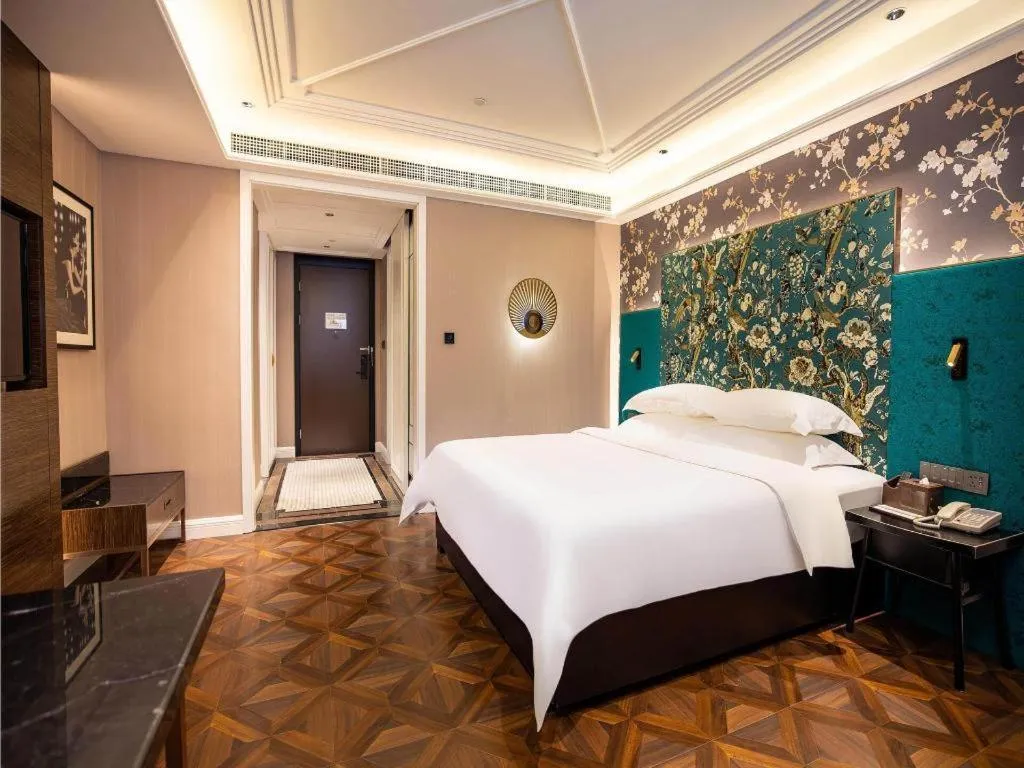 Bed in Metropolo Hotel Shijiazhuang Yuhua Wanda Plaza