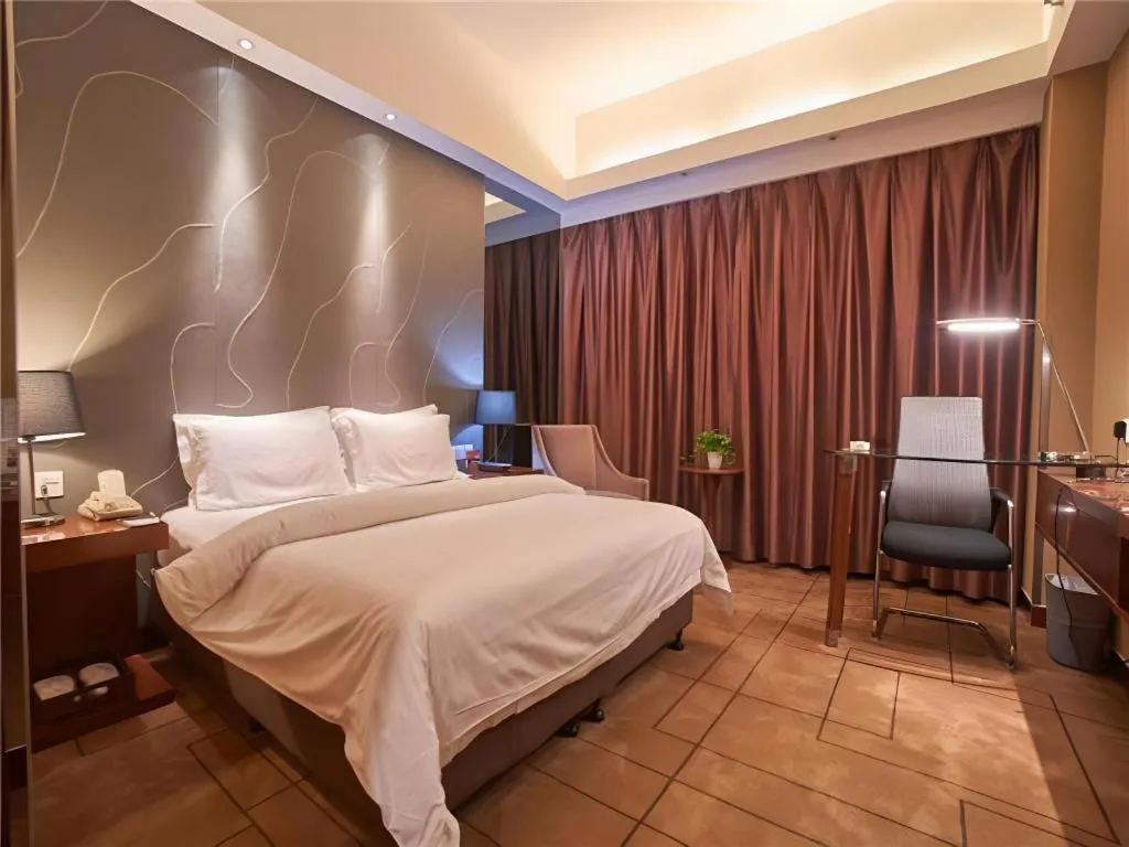 Bed in Metropolo Hotel Shijiazhuang Yuhua Wanda Plaza