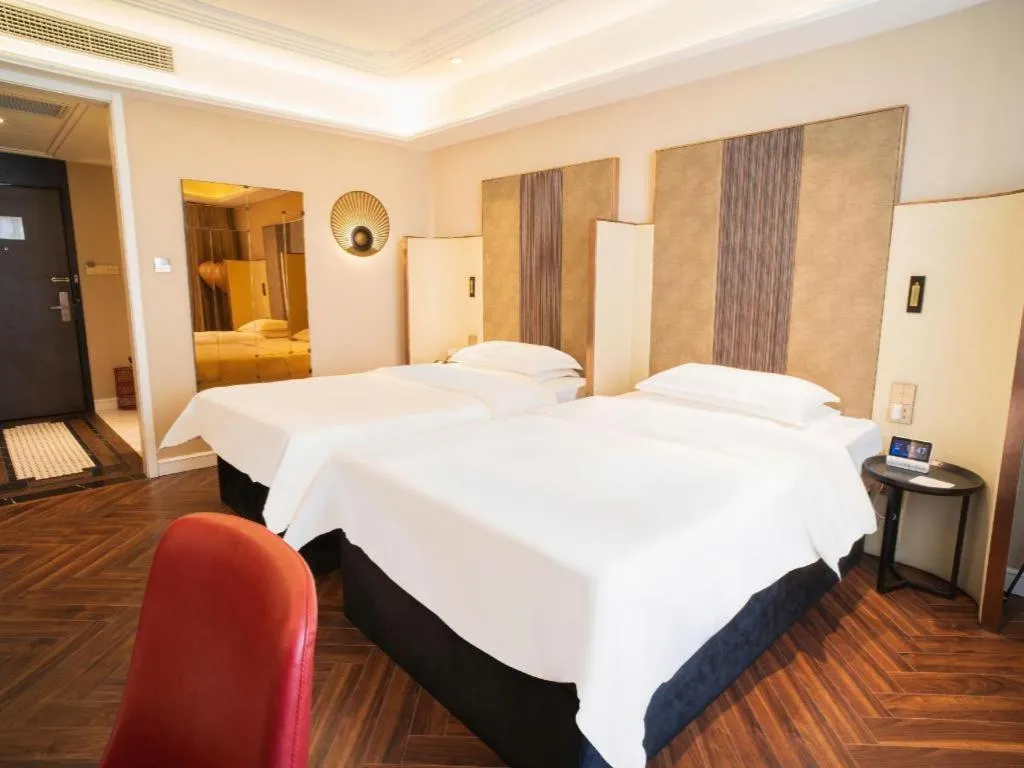 Bed in Metropolo Hotel Shijiazhuang Yuhua Wanda Plaza