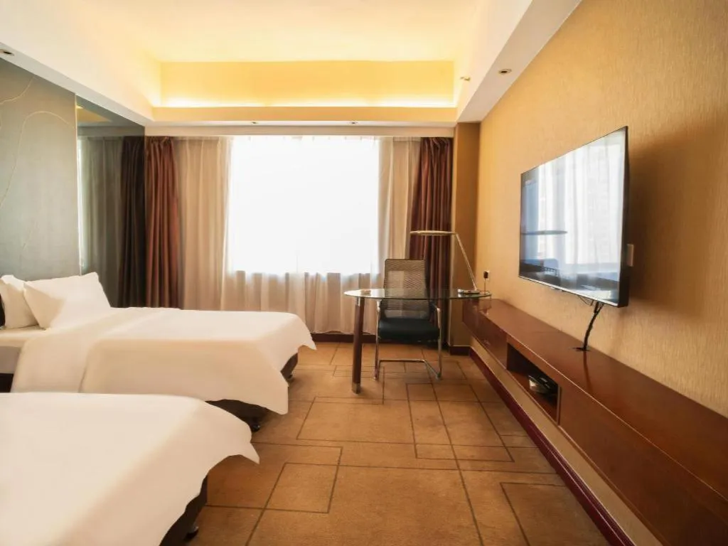 Bed in Metropolo Hotel Shijiazhuang Yuhua Wanda Plaza