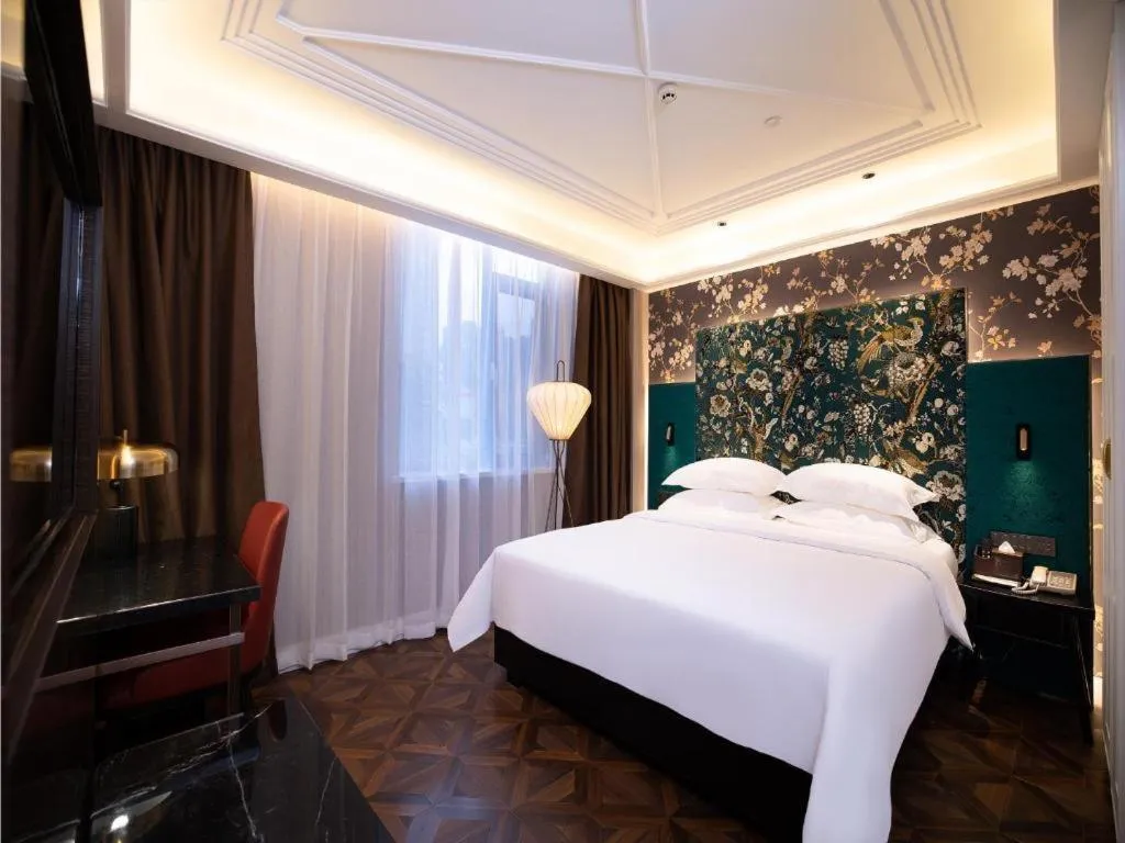 Bed in Metropolo Hotel Shijiazhuang Yuhua Wanda Plaza