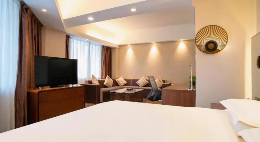 Bed in Metropolo Hotel Shijiazhuang Yuhua Wanda Plaza