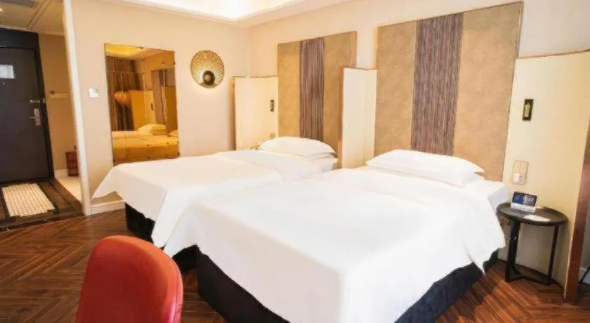 Bed in Metropolo Hotel Shijiazhuang Yuhua Wanda Plaza