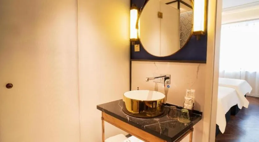 Bed in Metropolo Hotel Shijiazhuang Yuhua Wanda Plaza