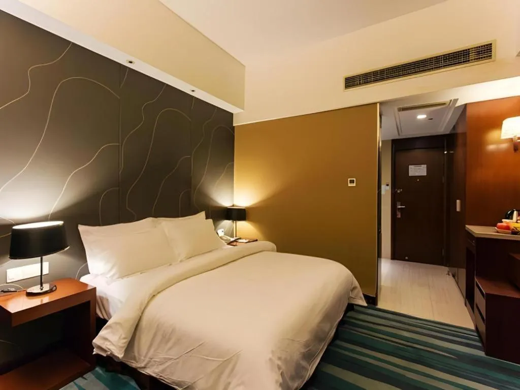 Bed in Metropolo Hotel Shijiazhuang Yuhua Wanda Plaza