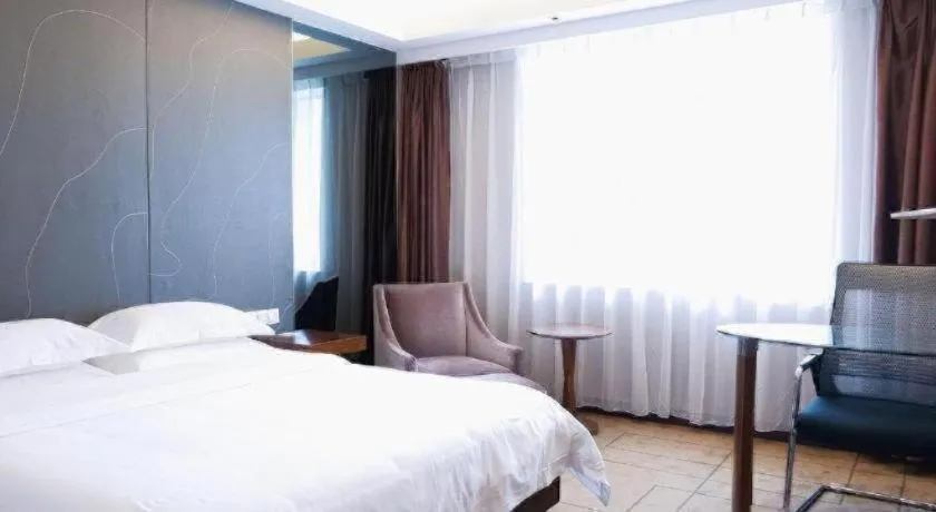 Bed in Metropolo Hotel Shijiazhuang Yuhua Wanda Plaza