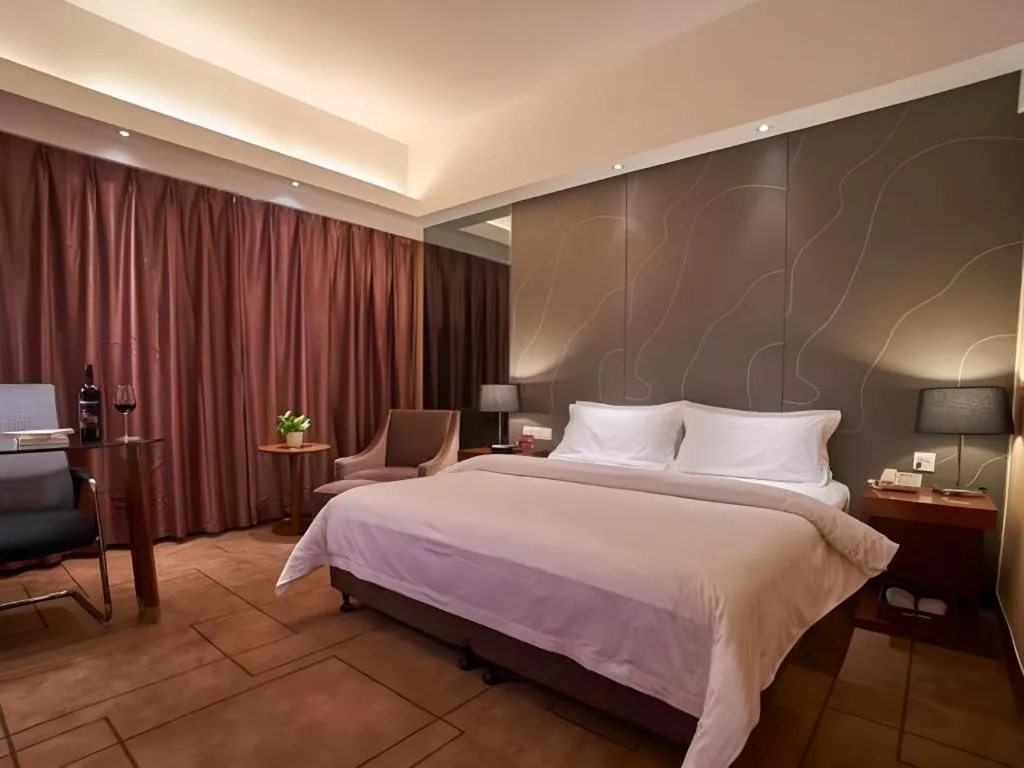 Bed in Metropolo Hotel Shijiazhuang Yuhua Wanda Plaza