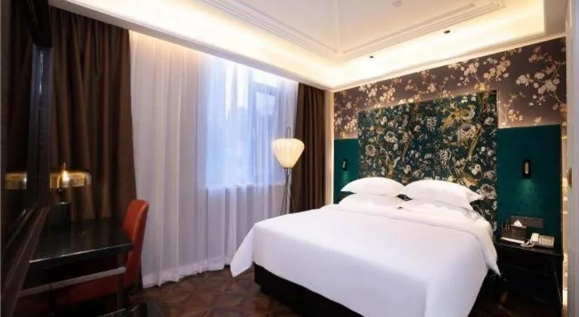 Bed in Metropolo Hotel Shijiazhuang Yuhua Wanda Plaza