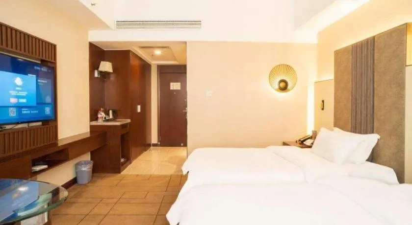 Bed in Metropolo Hotel Shijiazhuang Yuhua Wanda Plaza