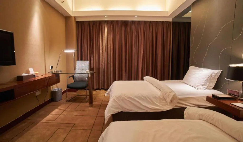 Bed in Metropolo Hotel Shijiazhuang Yuhua Wanda Plaza