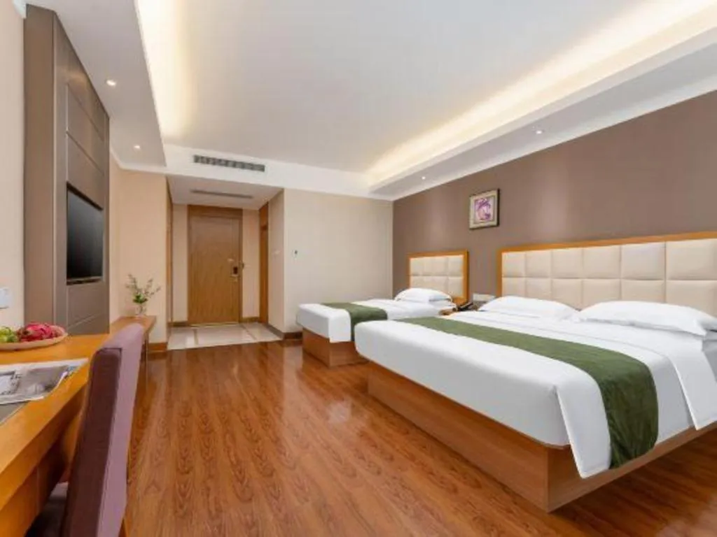 Bed in GreenTree Inn Shandong Taian Feicheng Xincheng Road Business Hotel