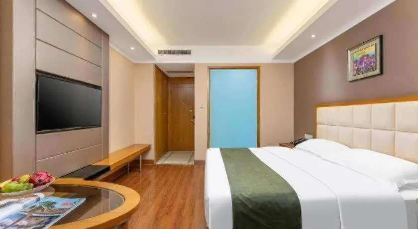 Bed in GreenTree Inn Shandong Taian Feicheng Xincheng Road Business Hotel